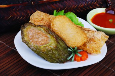 Yong Tau Fu. delicious Asian cuisine of fish paste stuffed clipart