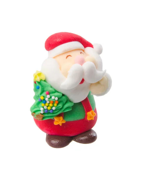 Santa claus figurku na pozadí — Stock fotografie
