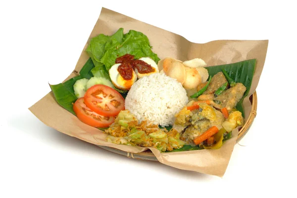 Nasi lemak traditional spicy rice dish — Stock Photo, Image