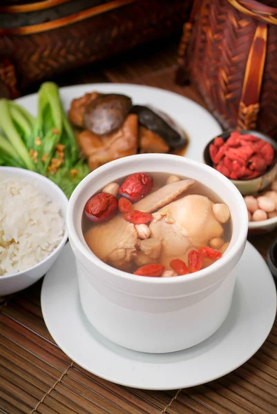 Chicken and herb soup, Chinese food style. — Stock Image Chicken and herb soup, Chinese food style. Royalty Free Stock Images