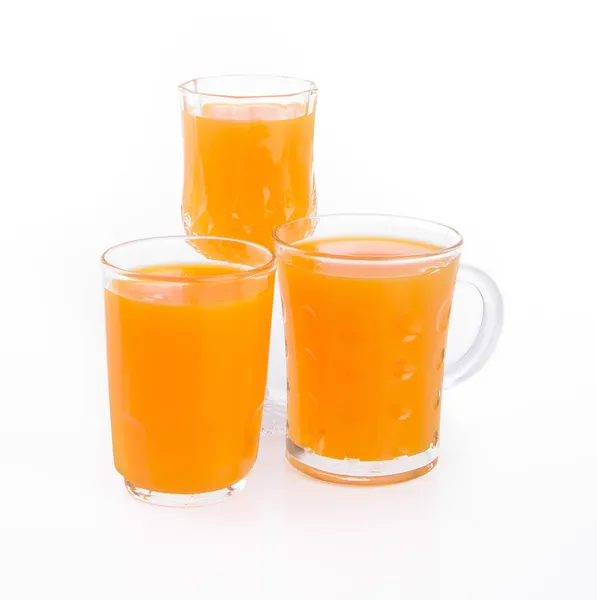 Orangensaft auf einem Hintergrund — Stockfoto