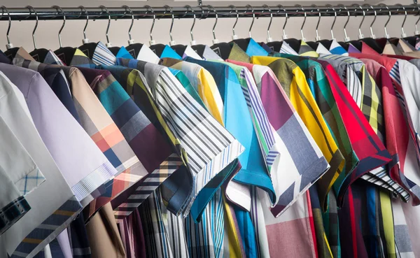 shirts. man shirts on hangers