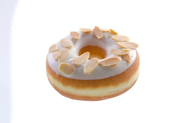 Çörek, badem donut zemin üzerine — Stok fotoğraf