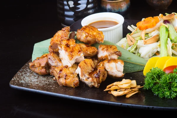 Japanese cuisine. grilled chicken on the background — Stock Photo, Image