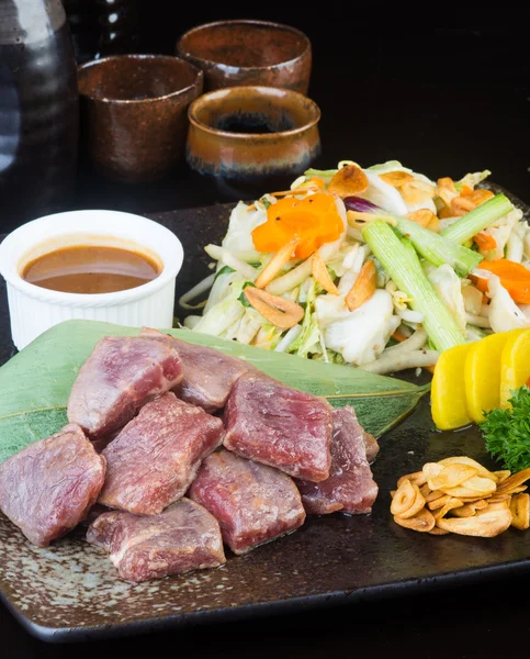 japanese cuisine. beef cube on the background