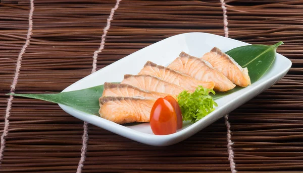 Japanese cuisine. fried fish on the background — Stock Photo, Image