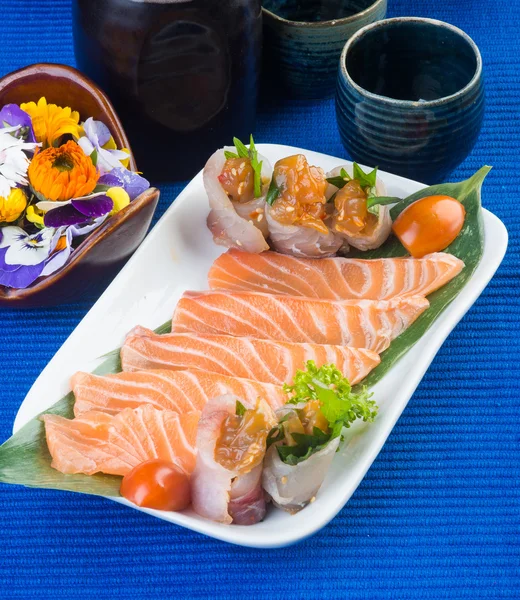 Japanese cuisine. sashimi on the background — Stock Photo, Image