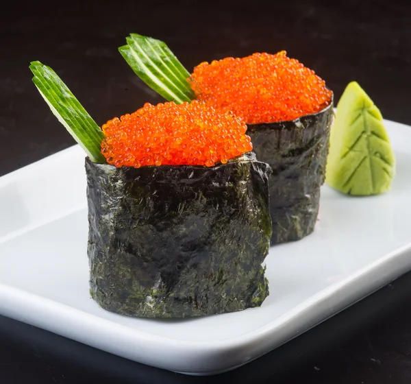 Cocina japonesa. sushi en el fondo — Foto de Stock