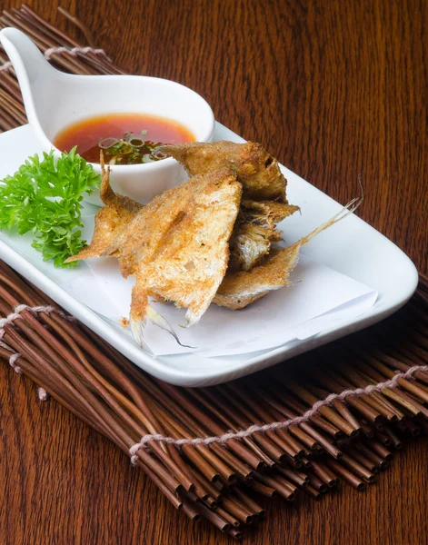 Japanese cuisine. fried fish on the background — Stock Photo, Image