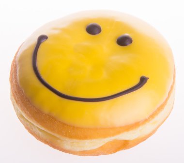 çörek. mutlu yüz donut zemin üzerine