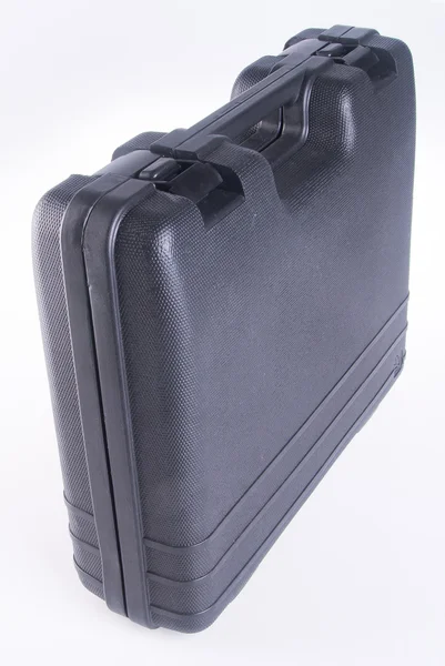Black plastic tool box on the background — Stock Photo, Image