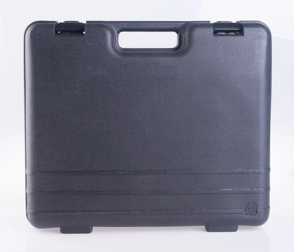 Black plastic tool box on the background — Stock Photo, Image