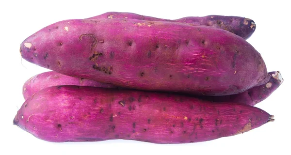 Słodkie ziemniaki na tle — Zdjęcie stockowe