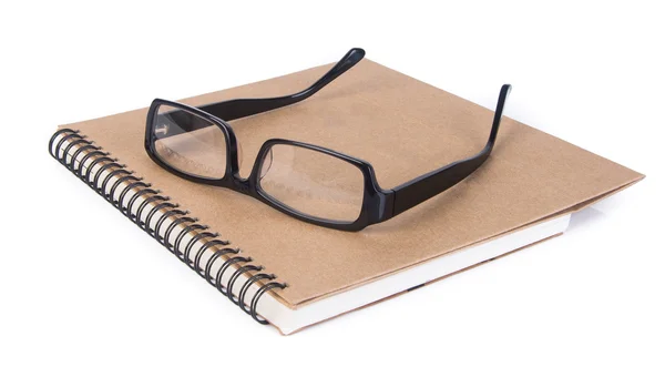Óculos oculares. óculos de olho com livro no fundo — Fotografia de Stock