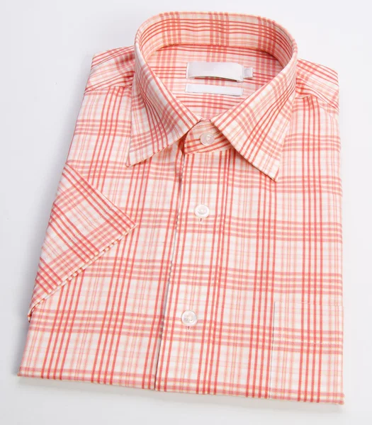 Camisa. camisa para hombre doblada sobre un fondo —  Fotos de Stock