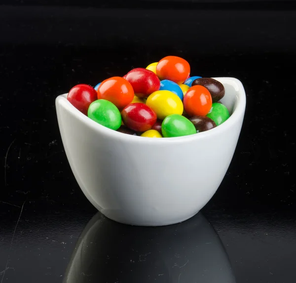 A háttér csokoládé labdák — Stock Fotó