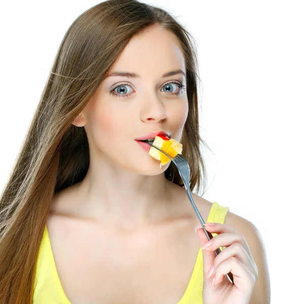 Portrait of a pretty young woman with fruit isolated on a white background — Stock Photo, Image