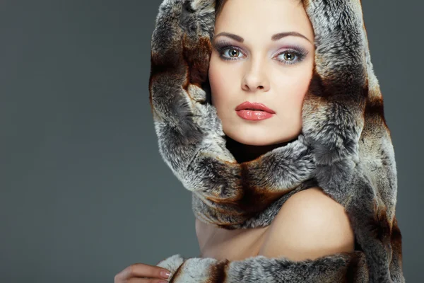 A photo of sexual beautiful girl is in fur clothes — Stock Photo, Image