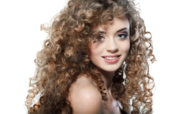 Young beautiful woman with long curly hairs — Stock Photo, Image