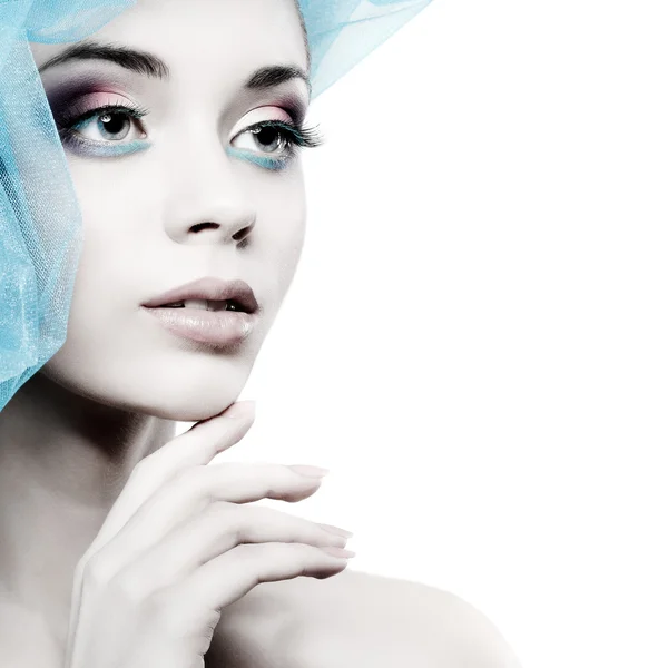 Portrait of beautiful girl with a hat from a blue veil — Stock Photo, Image