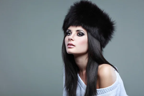 A photo of sexual beautiful girl is in fur clothes — Stock Photo, Image