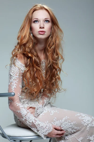 A portrait of stylish elegant redheaded girl is in lace clothes . — Stock Photo, Image