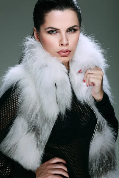 A photo of sexual beautiful girl is in fashion style is in fur clothes — Stock Photo, Image