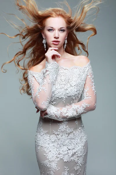 A portrait of stylish elegant redheaded girl is in lace clothes . — Stock Photo, Image