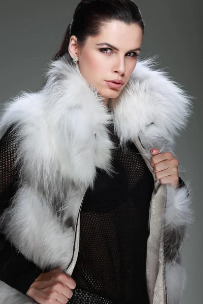 A photo of sexual beautiful girl is in fashion style is in fur clothes — Stock Photo, Image