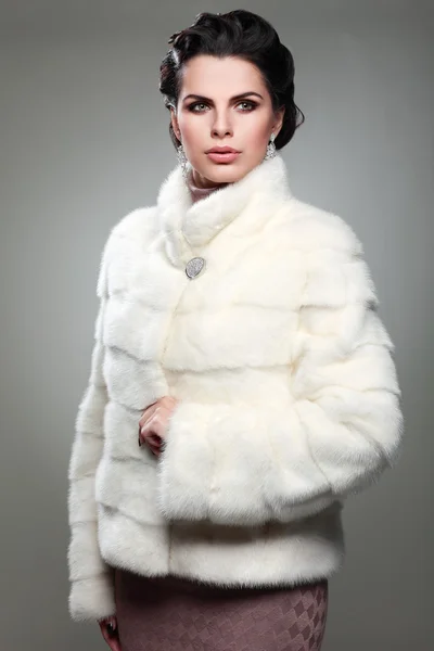 A photo of sexual beautiful girl is in fur clothes — Stock Photo, Image