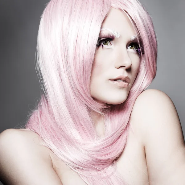 Portrait of beautiful sexual girl in a pink wig — Stock Photo, Image