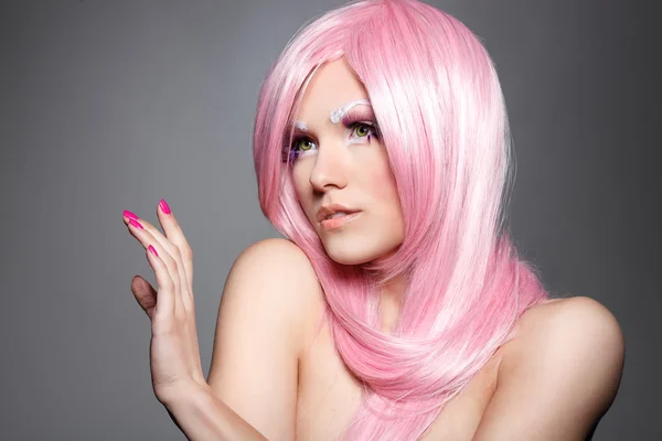 Portrait of beautiful sexual girl in a pink wig — Stock Photo, Image