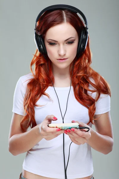 Beautiful girl with headphones — Stock Photo, Image