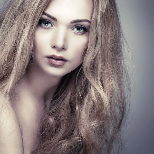Beautiful  girl, isolated on a light - grey  background, emotions, cosmetics — Stock Photo, Image