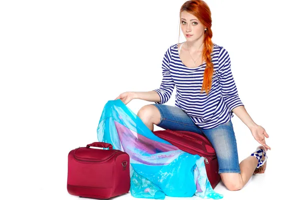 Beautiful redheaded tourist woman . Isolated on a white background — Stock Photo, Image