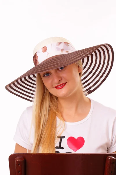 Bella donna bionda con un cappello — Foto Stock