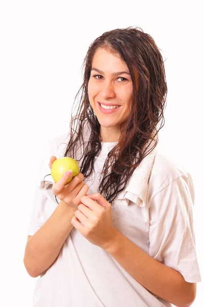 Atrakcyjna młoda kobieta brunetka z jabłkiem — Zdjęcie stockowe