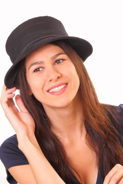 Handsome young brunette woman in a hat — Stock Photo, Image