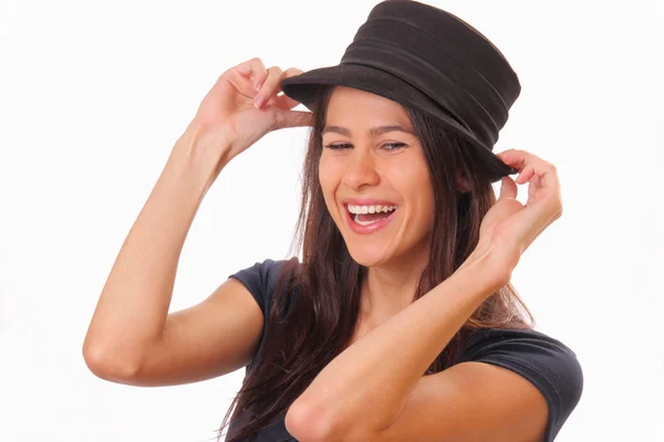Happy young brunette woman in a hat — Stock Photo, Image