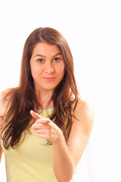 Pretty young brunette woman in a yellow shirt — Stock Photo, Image