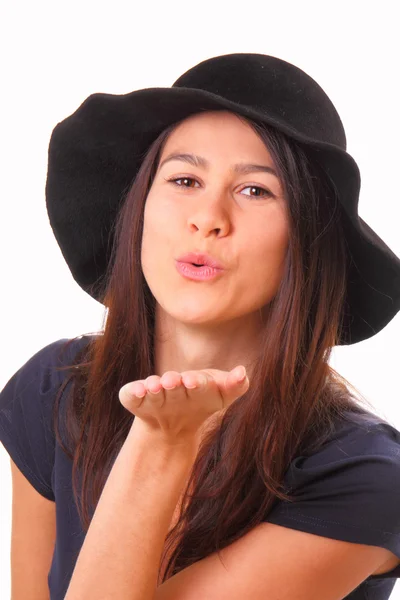 Happy young woman in a black hat — Stock Photo, Image