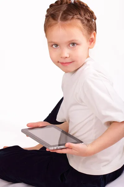 Happy little girl with ipad — Stock Photo, Image