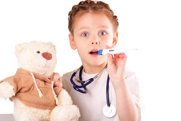 Surprised little doctor girl — Stock Photo, Image