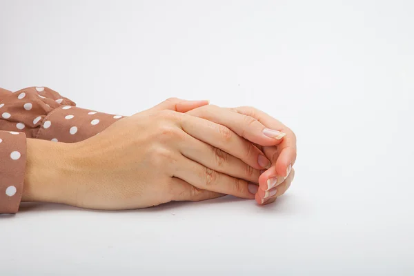 Geïsoleerde vrouwelijke handen aanraking — Stockfoto