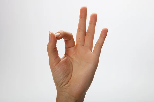 Geïsoleerde vrouwelijke handen aanraking — Stockfoto