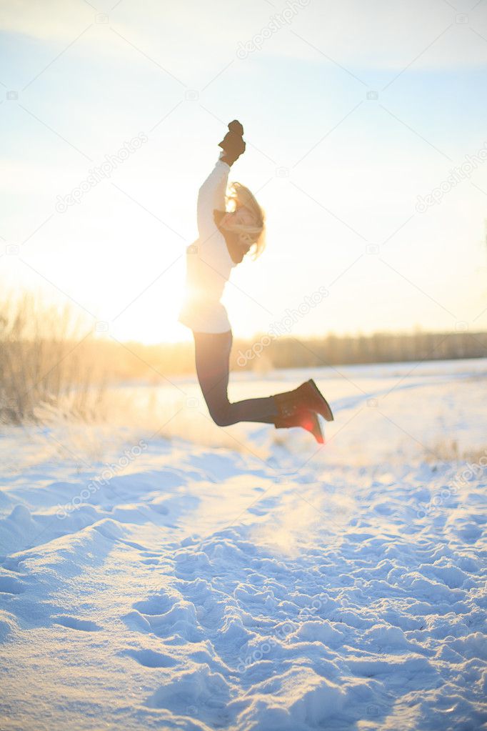 Happy female in winter forest