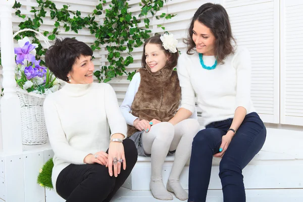 Cute little girl, her mother and grandmother together on this portrait — Stock Photo, Image