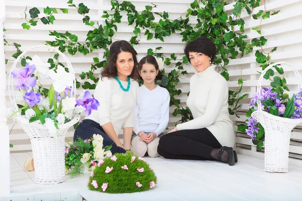 Cute little girl, her mother and grandmother together on this portrait — Stock Photo, Image