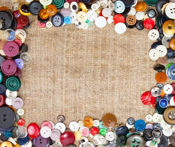 Vintage Sewing Buttons Framing Fabric Background — Stock Photo, Image