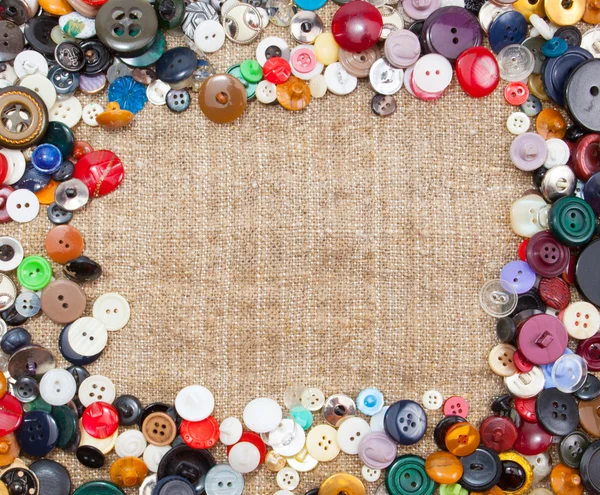 Vintage Sewing Buttons Framing Fabric Background — Stock Photo, Image